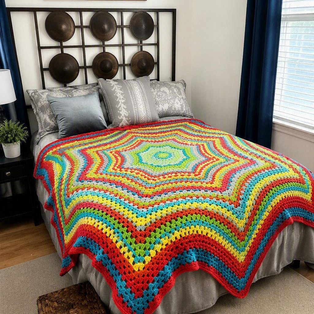 Custom blanket example: rainbow star crochet blanket on bed